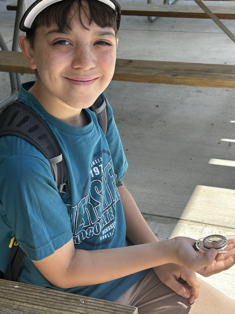 student using a compass