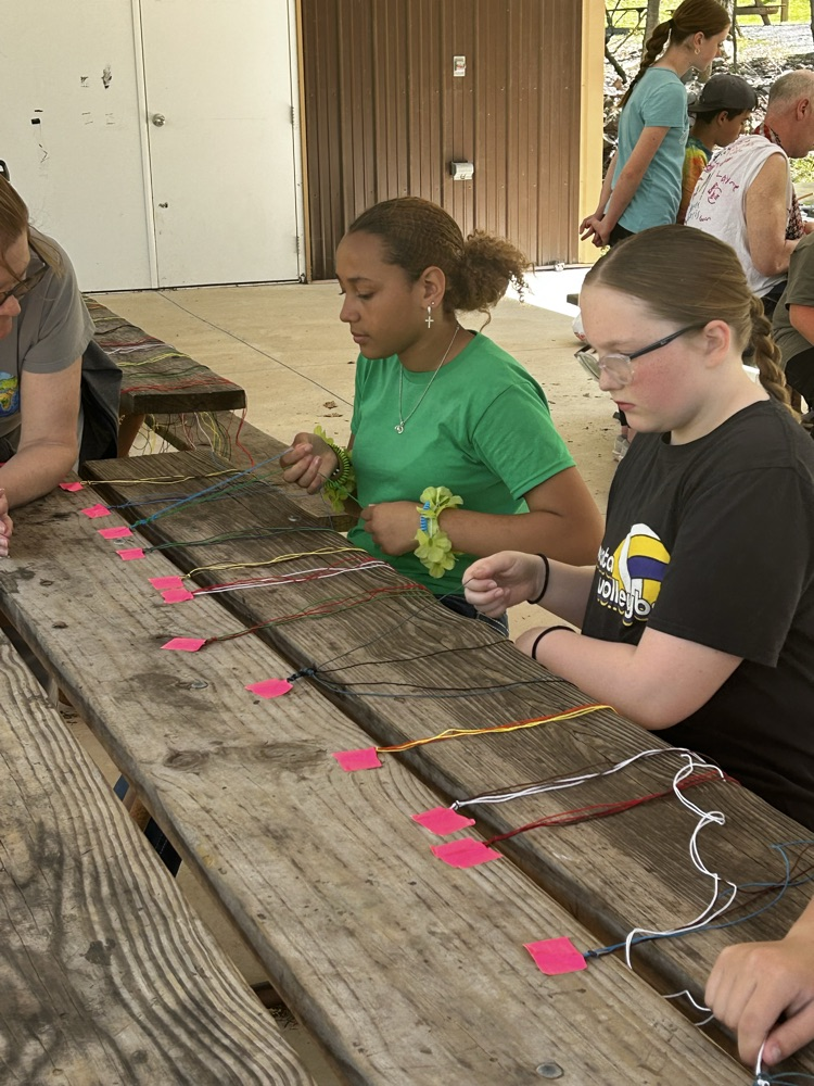 students making bracelets
