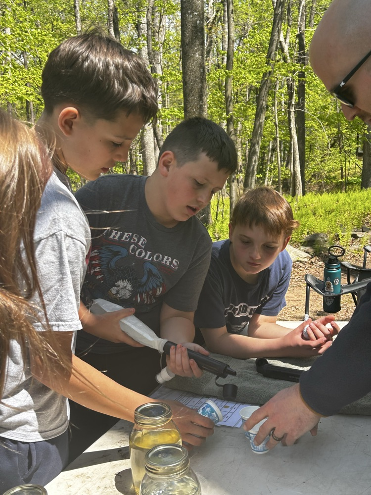 students studying water