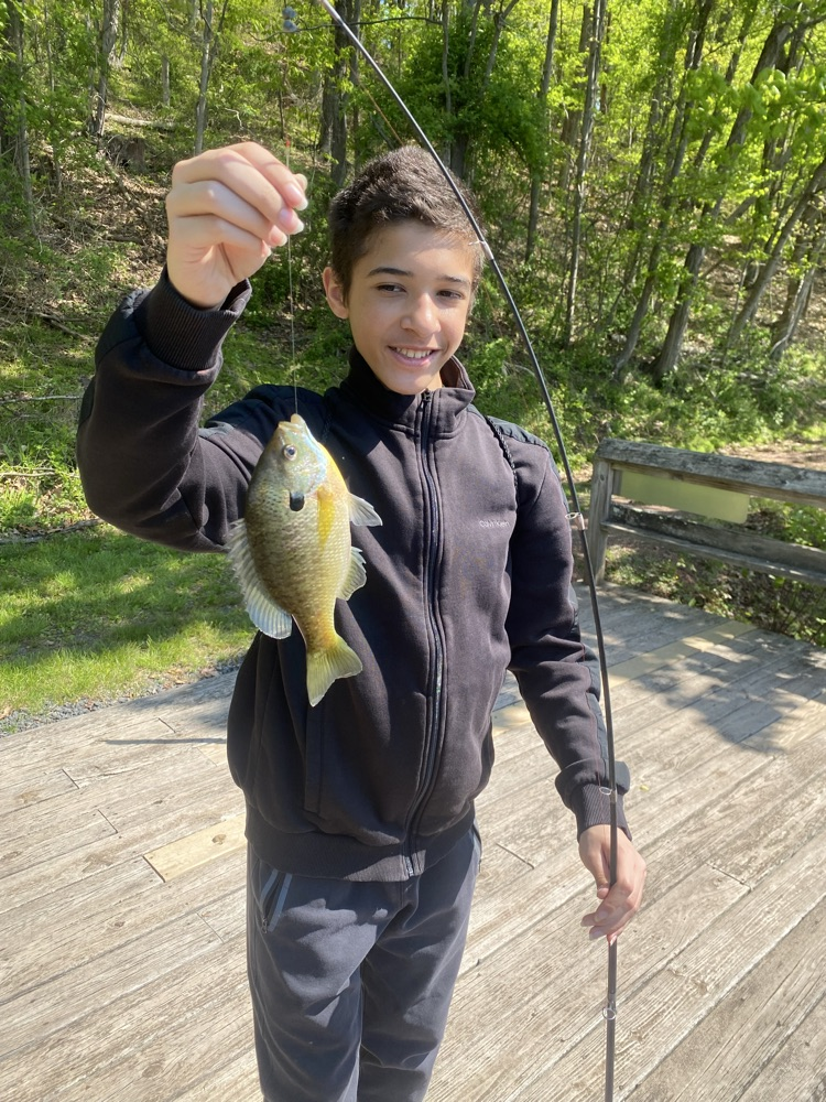 student with a fish