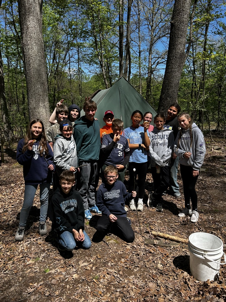 students at a campsite