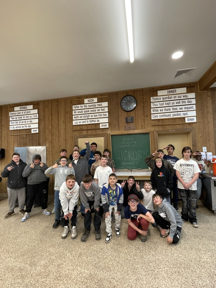 students in a dining hall posing for a picture