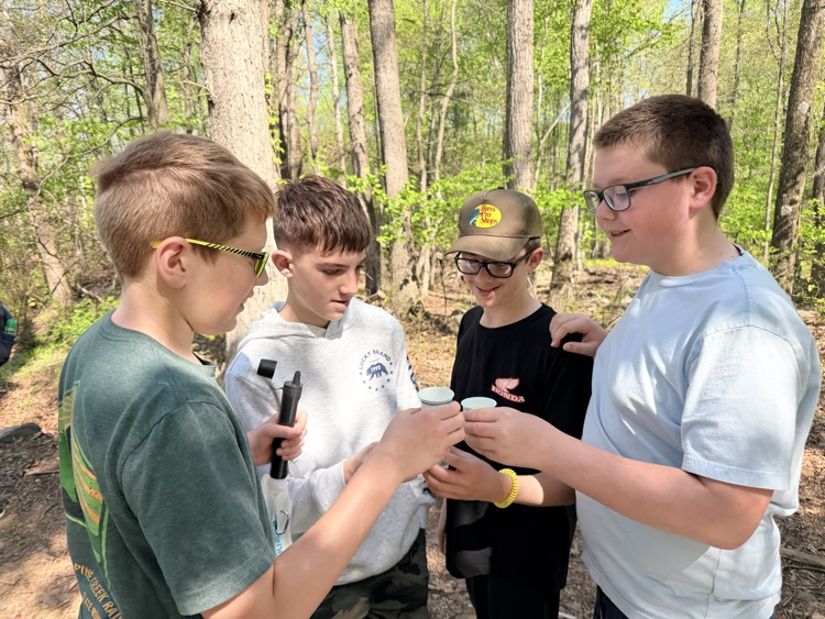 students at a creek study