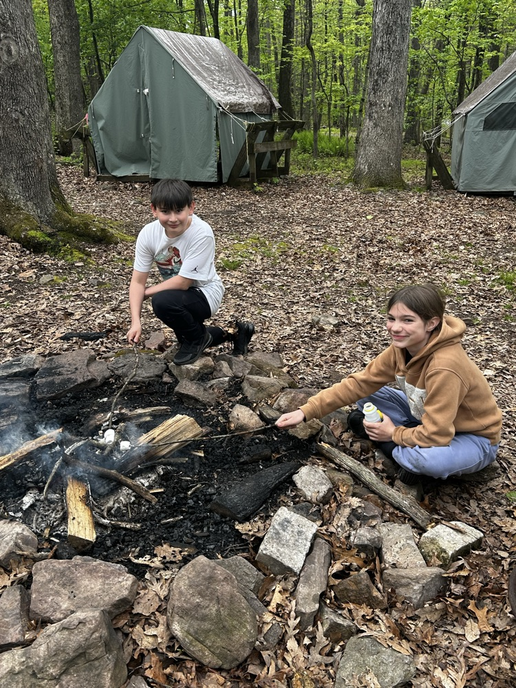 students roasting marshmallows