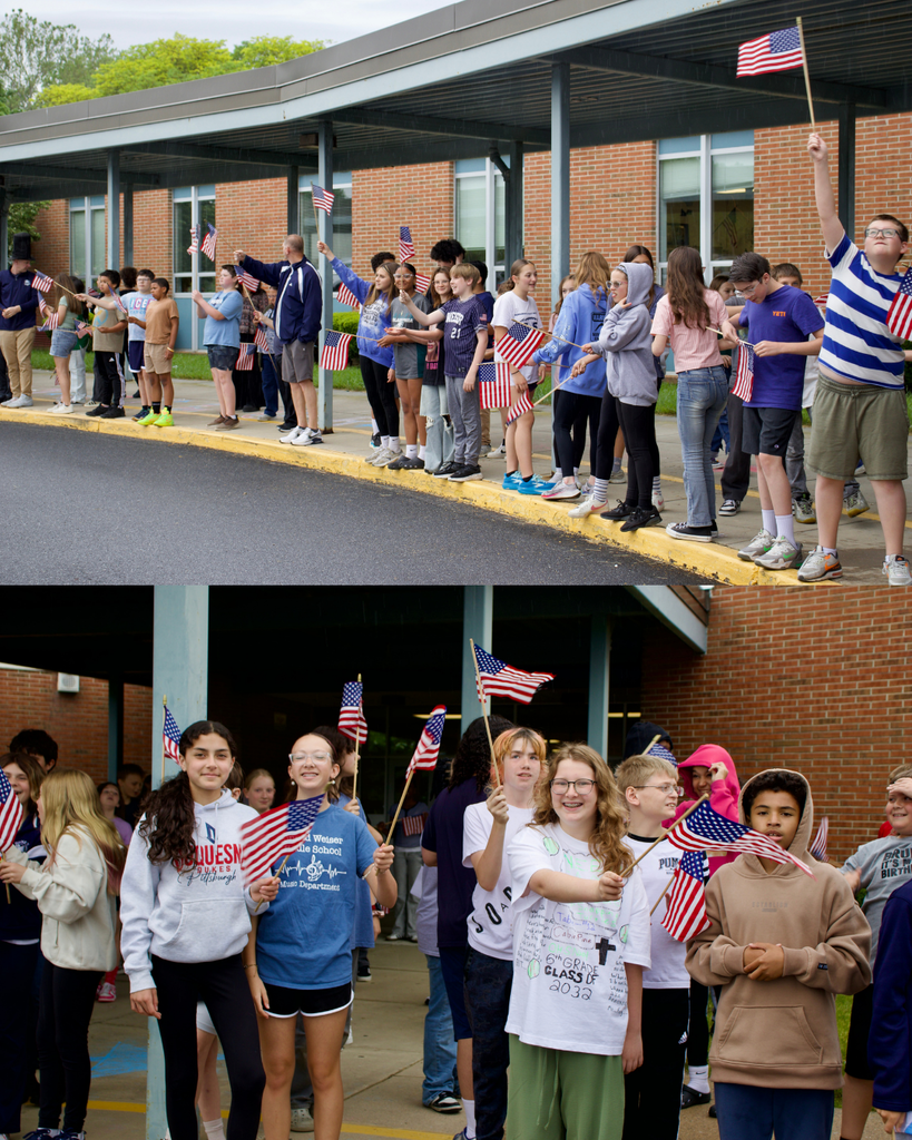 Students waiving American flags
