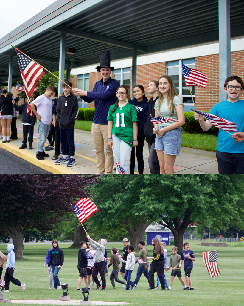 Students waiving American flags