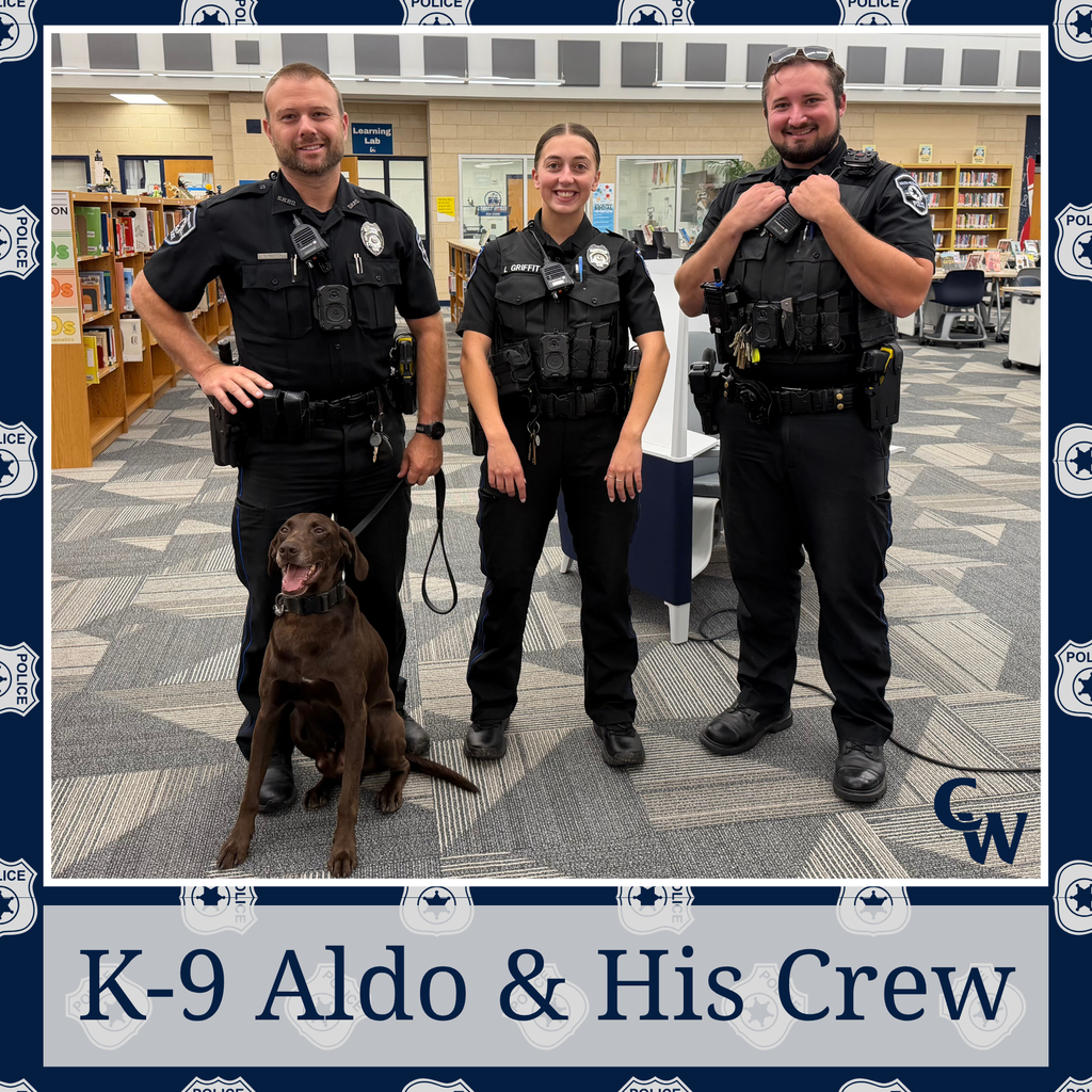 3 police officers and K-9 Aldo in the CWHS library