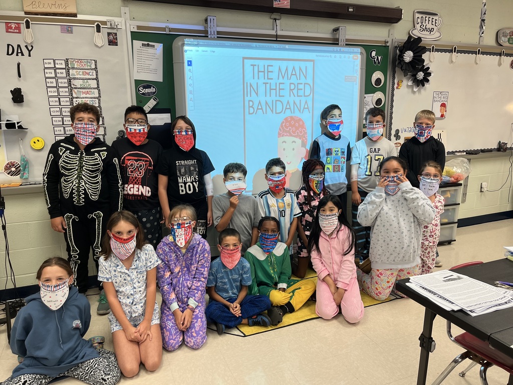 Elementary students pictured in their bandanas they made for patriot day