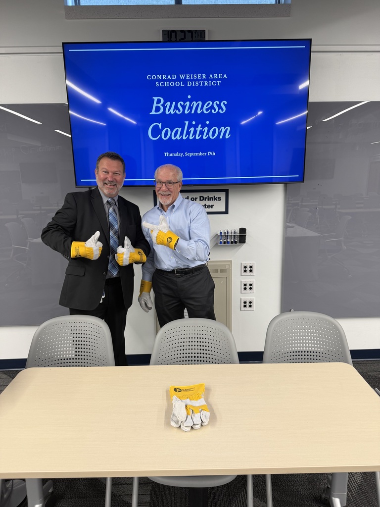 superintendent and business owner giving thumbs up with gloves on