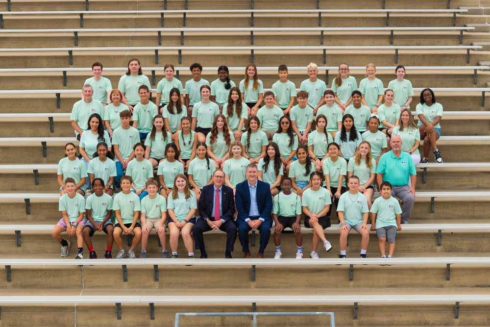 Rob Eissler and Dr. Ted Landry with students and sponsors of Conroe ISD's Student Leadership Academy.