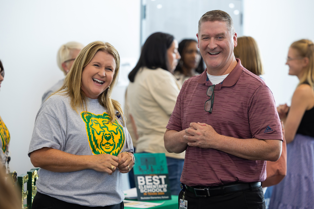 Administrators smiling