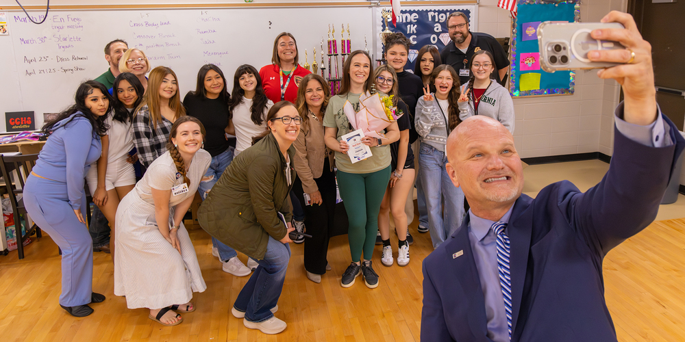 Dr Vinson and a Caney Creek High School Texas Standard Award winner
