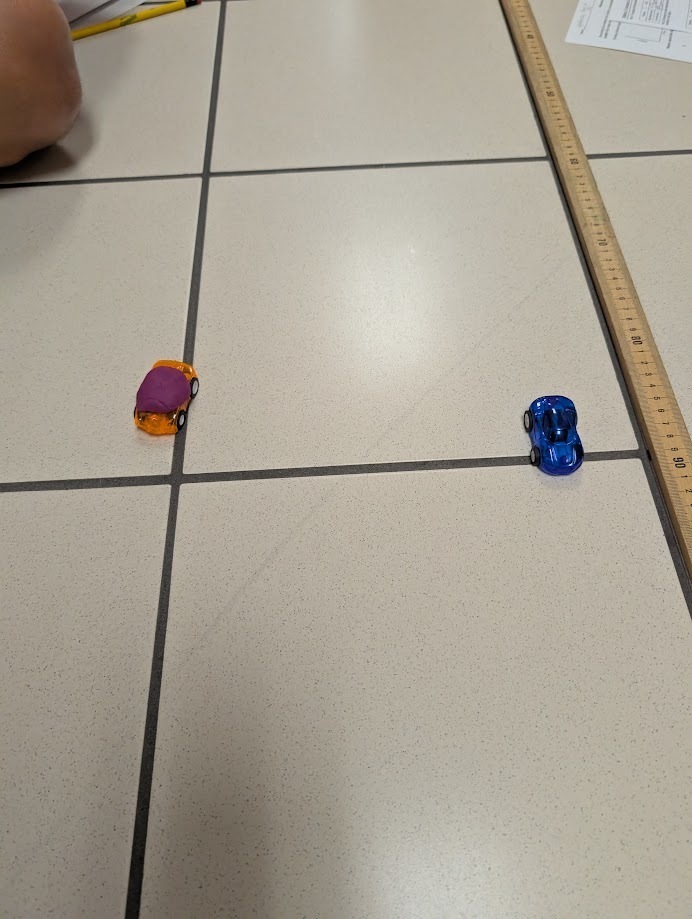 Car with mass and car without added mass.