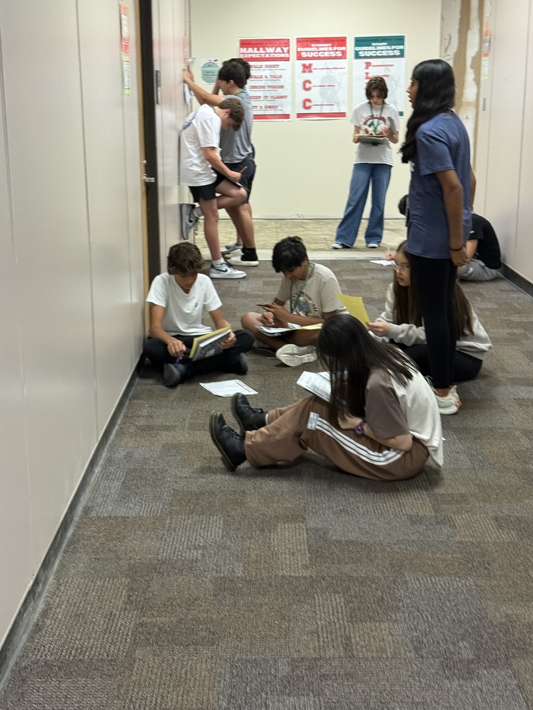 Mrs. Roberts' 8th grade ELA class rotated through stations to practice embedding quotes.