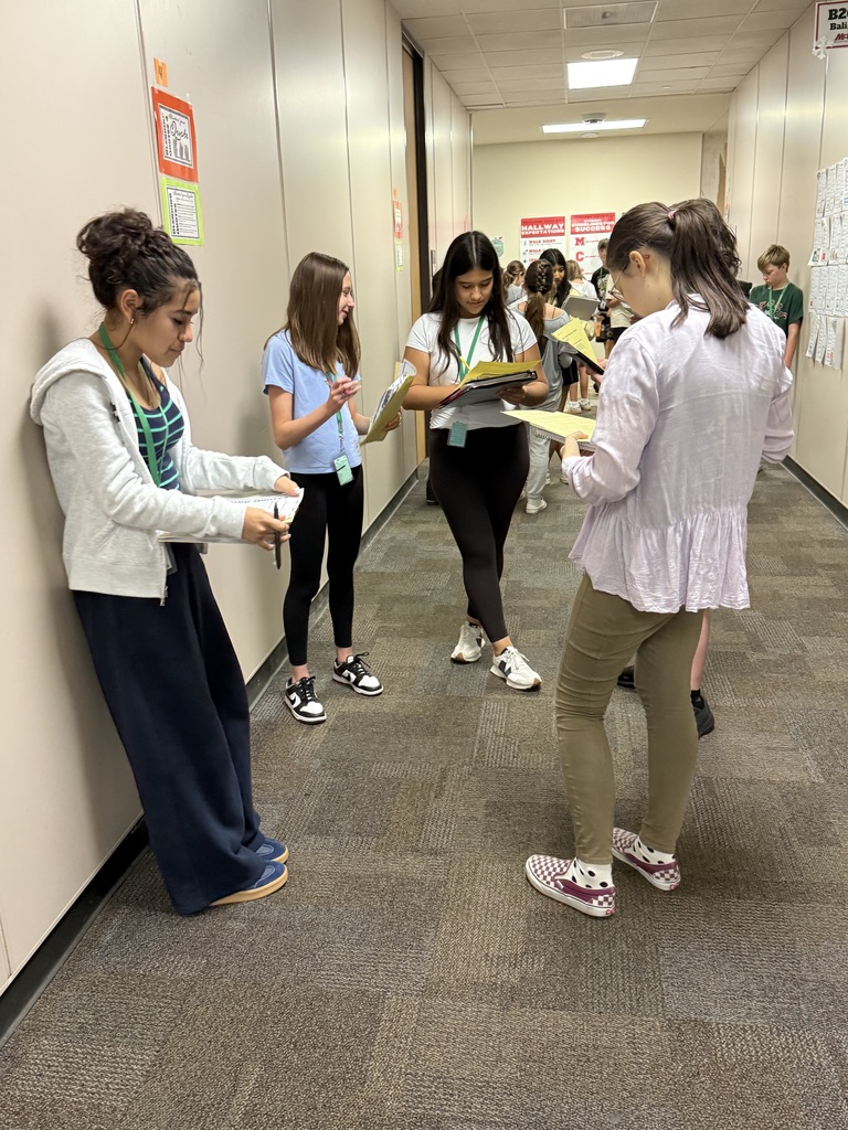 Mrs. Roberts' 8th grade ELA class rotated through stations to practice embedding quotes.