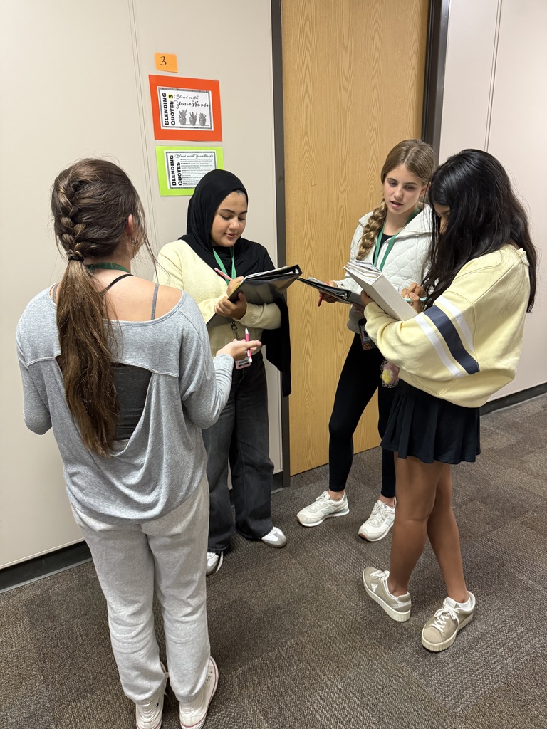 Mrs. Roberts' 8th grade ELA class rotated through stations to practice embedding quotes.