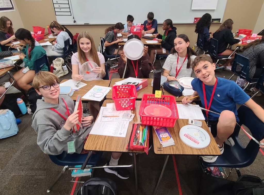When the students measure the large hula hoop, they got C=239 cm and d=79 cm. 239/79 = 3.14473... We were so EXCITED to get is so close to pi!!!!