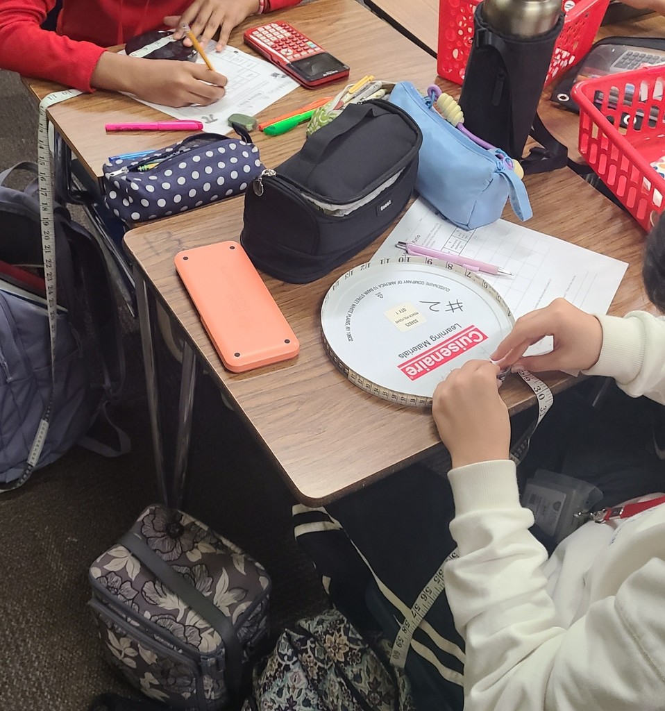 When the students measure the large hula hoop, they got C=239 cm and d=79 cm. 239/79 = 3.14473... We were so EXCITED to get is so close to pi!!!!