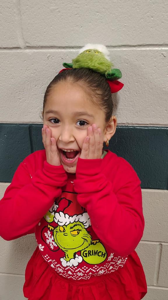 girl with grinch face