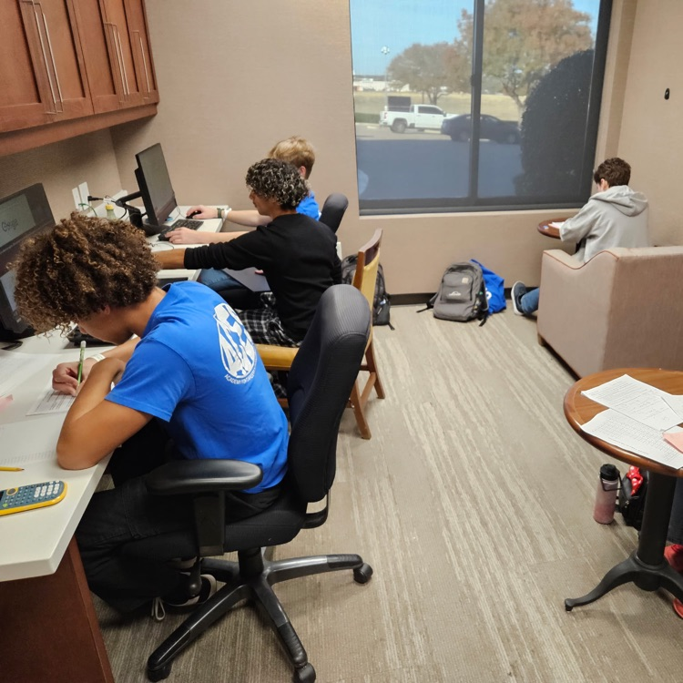 The work never ends. Completing school work while away.