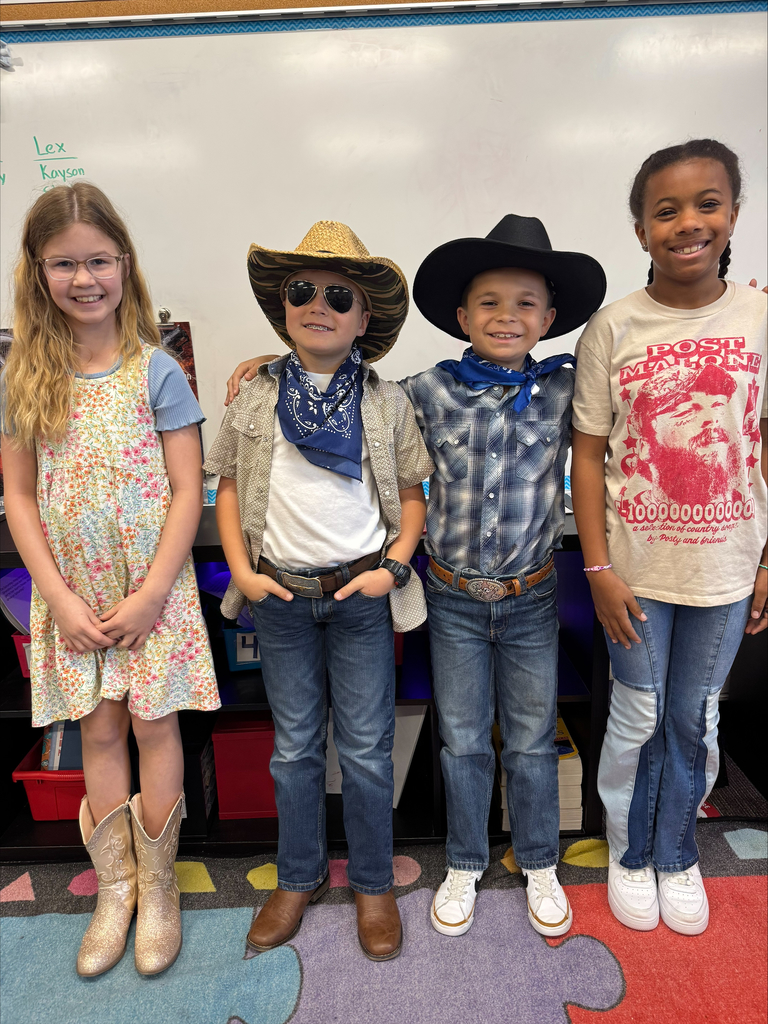 A group of students dressed in Western attire.