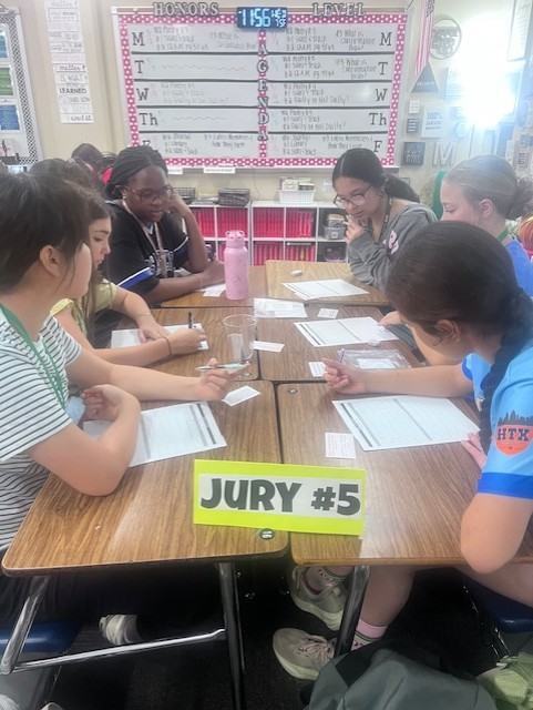 Mrs. McGowan's 8th Grade Language Arts students served jury duty today to examine evidence and deliberate verdicts of court cases after finishing reading the play 12 Angry Men.