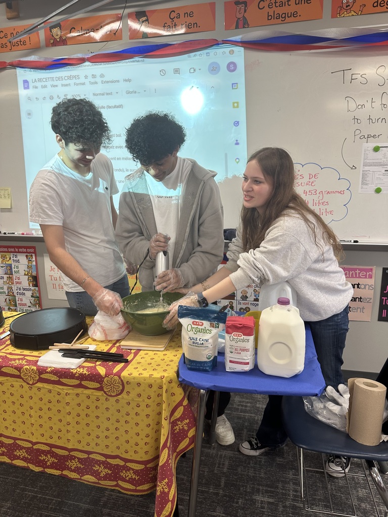 Students making French Crepes. 