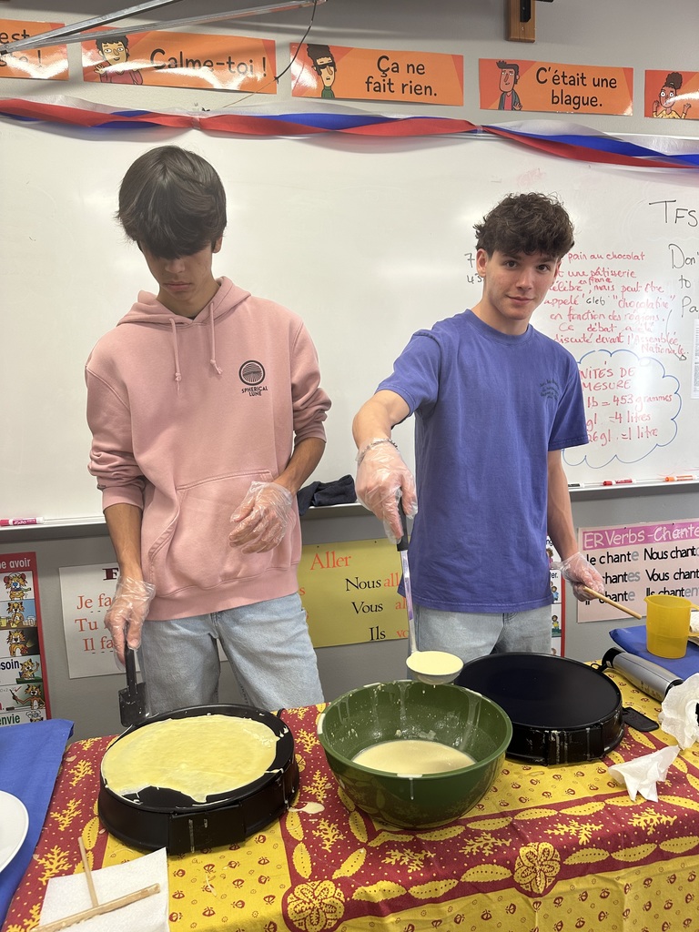Students making French Crepes. 