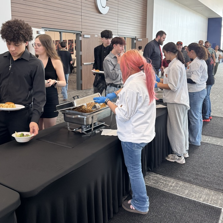 culinary serves food at basketball banquet