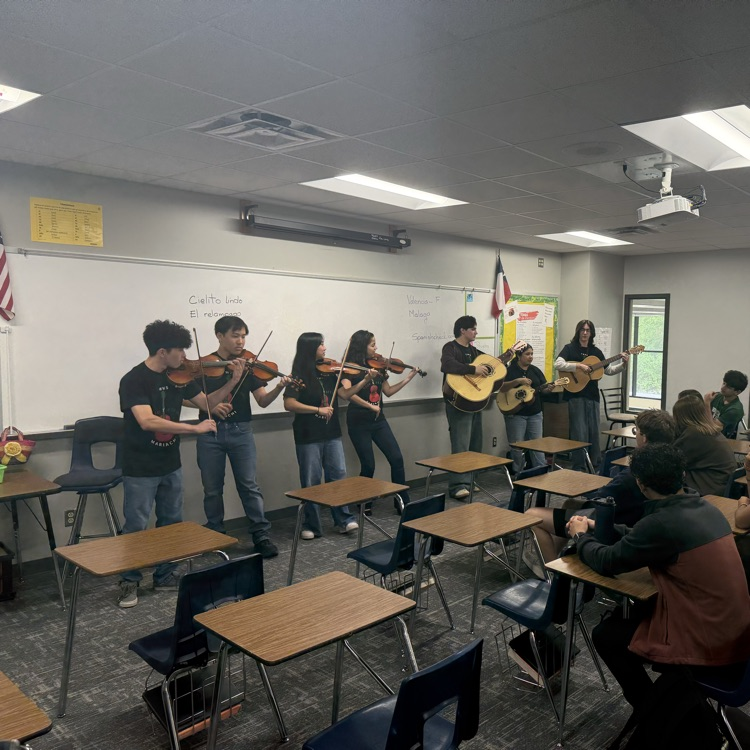 mariachi performs in Spanish class 