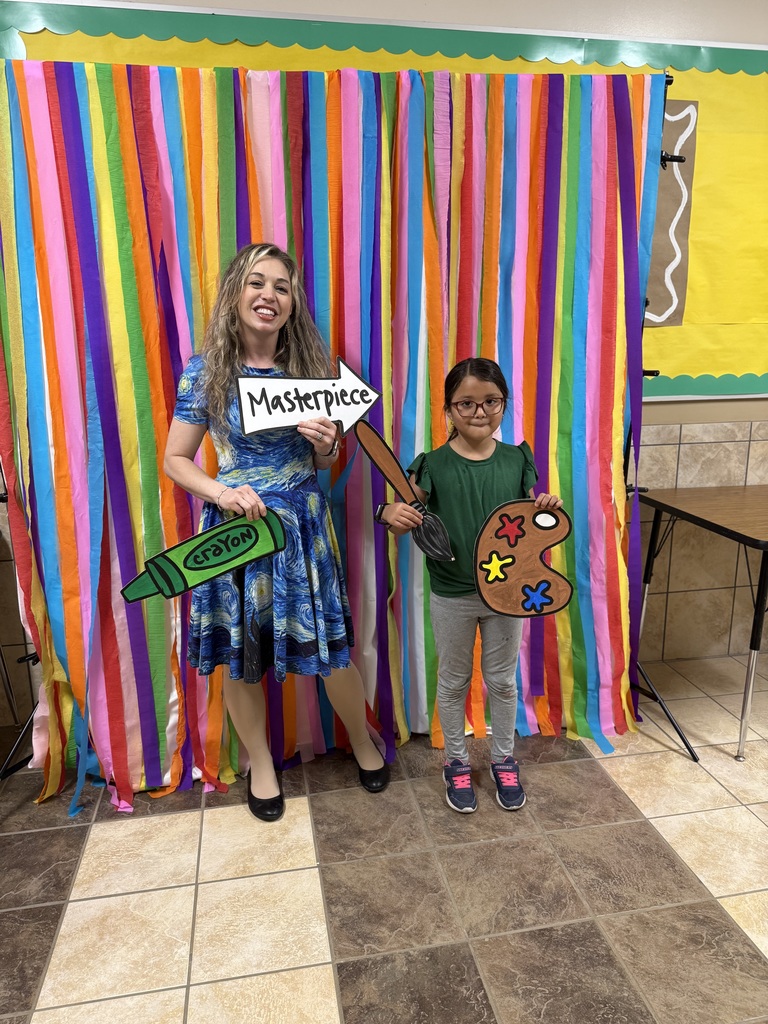 kid with teacher at art night