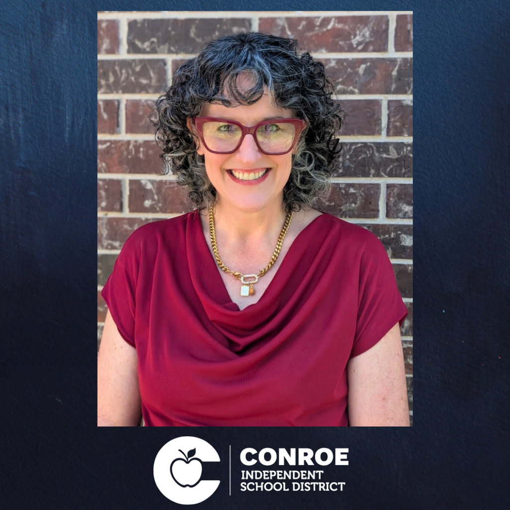 A smiling woman with curly gray hair and red glasses stands in front of a brick wall; “Conroe Independent School District” logo appears below.