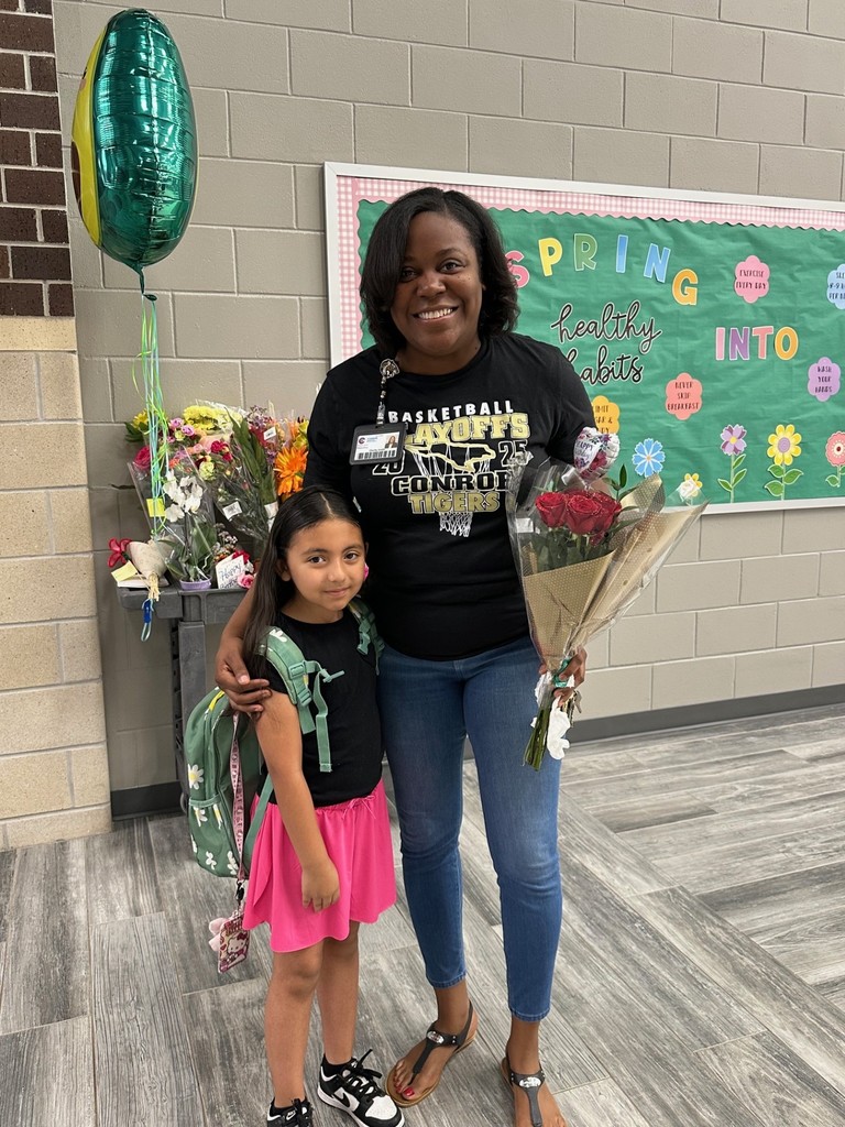 Mrs. Smith received so many flowers from students today.