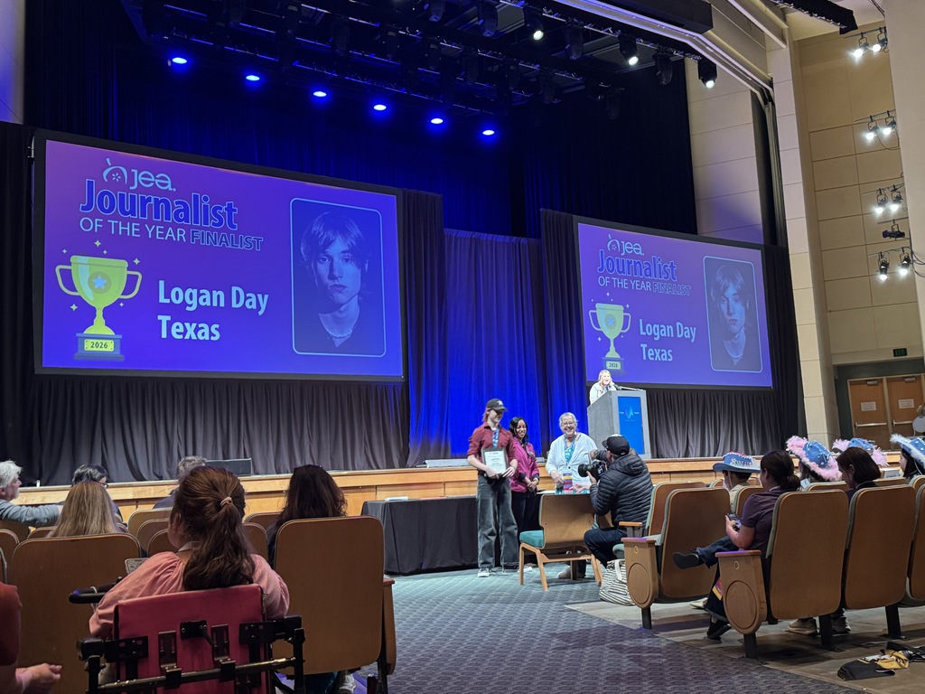 Logan Day accepts his award as a finalist for Journalist of the Year. 