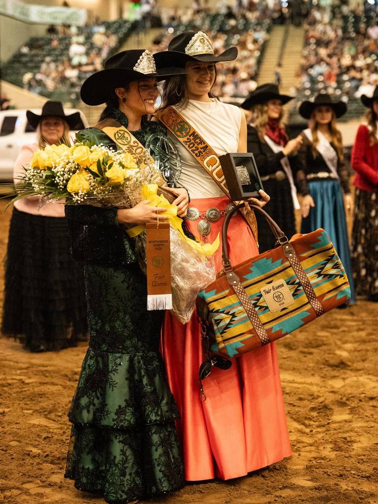 Montgomery County Fair Queen Delaney Miller (left) congratulated by last year's Fair Queen.