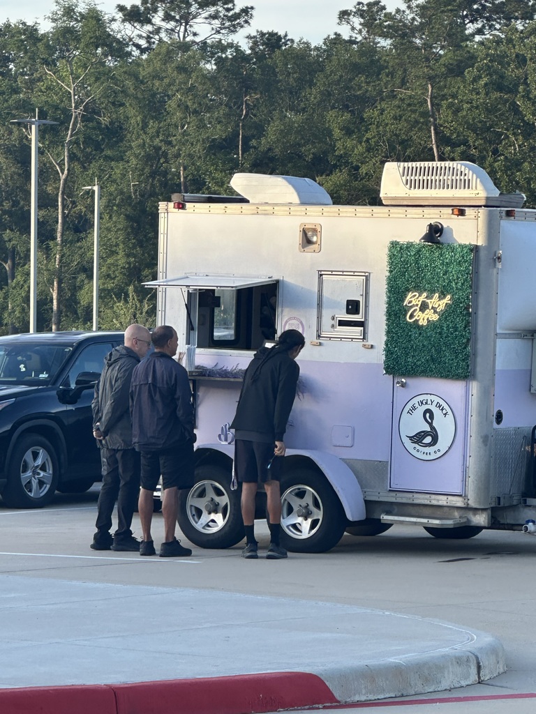 Teachers picking out their coffee choice from the coffee truck. 
