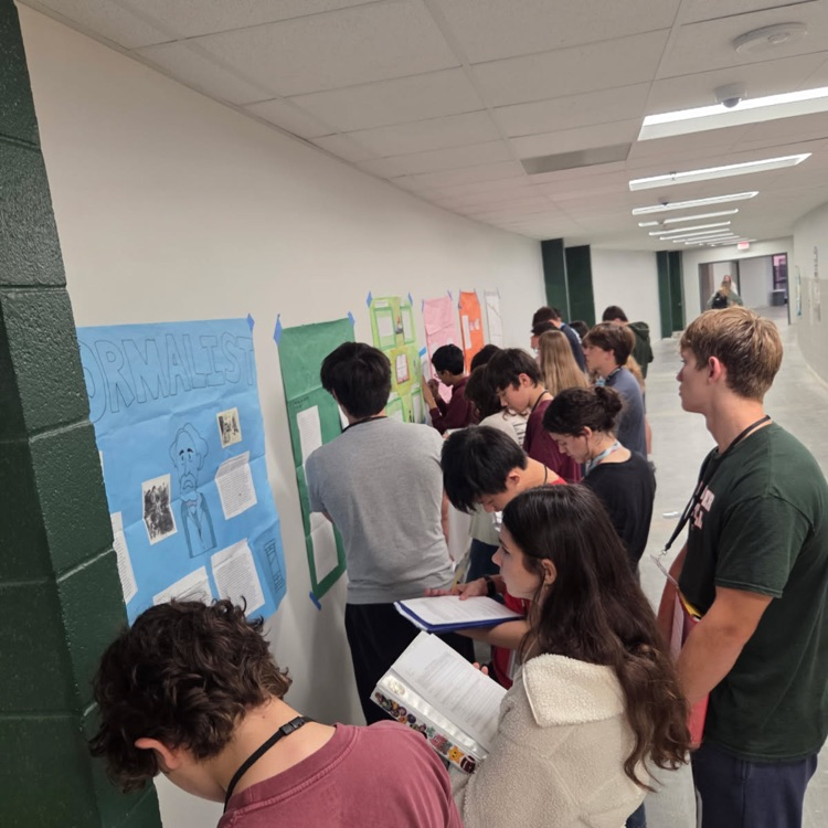 Students in Honors English II explored the novel A Tale of Two Cities through different critical lenses then worked in groups to present their findings for a gallery walk. 