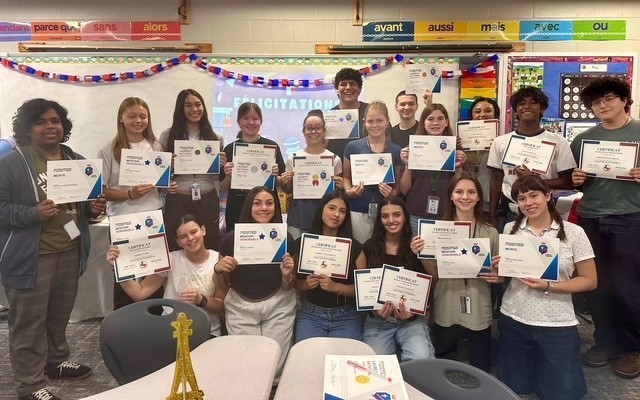 French 1 students receiving awards for the Texas French Symposium (state competition) and Le Grand Concours (global competition)!  So proud of all my students who participated!! 🥐🇫🇷🥰