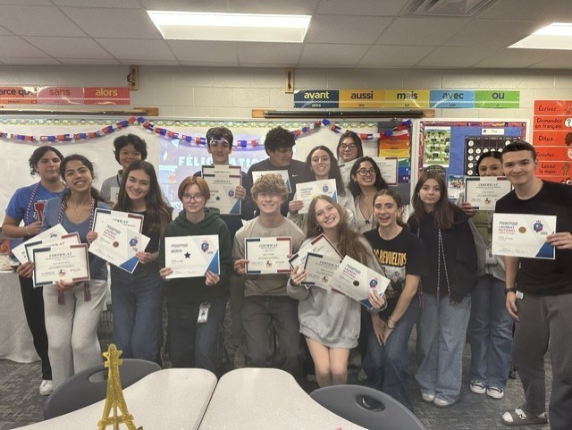 The French students at TWHS celebrated a successful end of the year. The team placed second at the Texas French Symposium, with Maria Jose Ibarra placing 6th overall and Kaissa Hecham placing 4th. We had 4 1st places, 13 second places,12 3rd places, 3 fourth places, seven 5th places and 6 sixth places.     In the Grand Concours exam, we had 5 gold, 10 silver and 9 bronze medals. Seventeen students received honorable mention and twelve received merit.     TWHS’s Chapter of the French National Honor Society also gave out 16 graduation cords to seniors. 