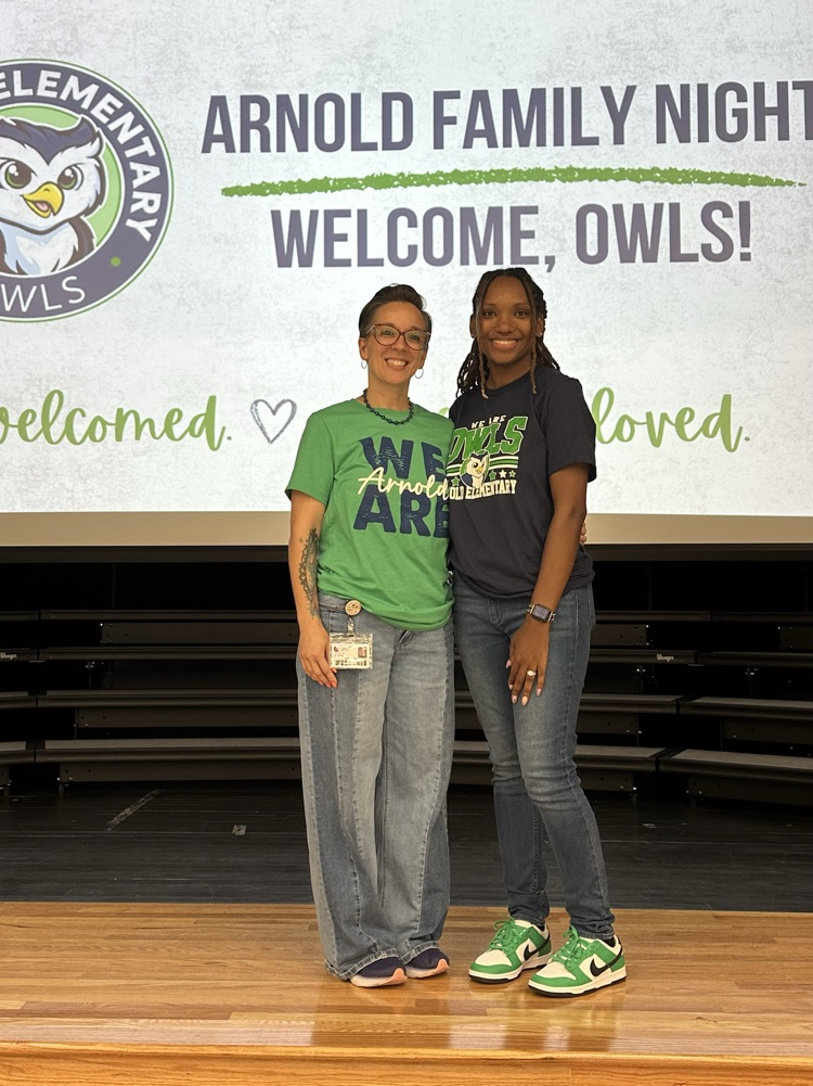 2 female counselors on a stage