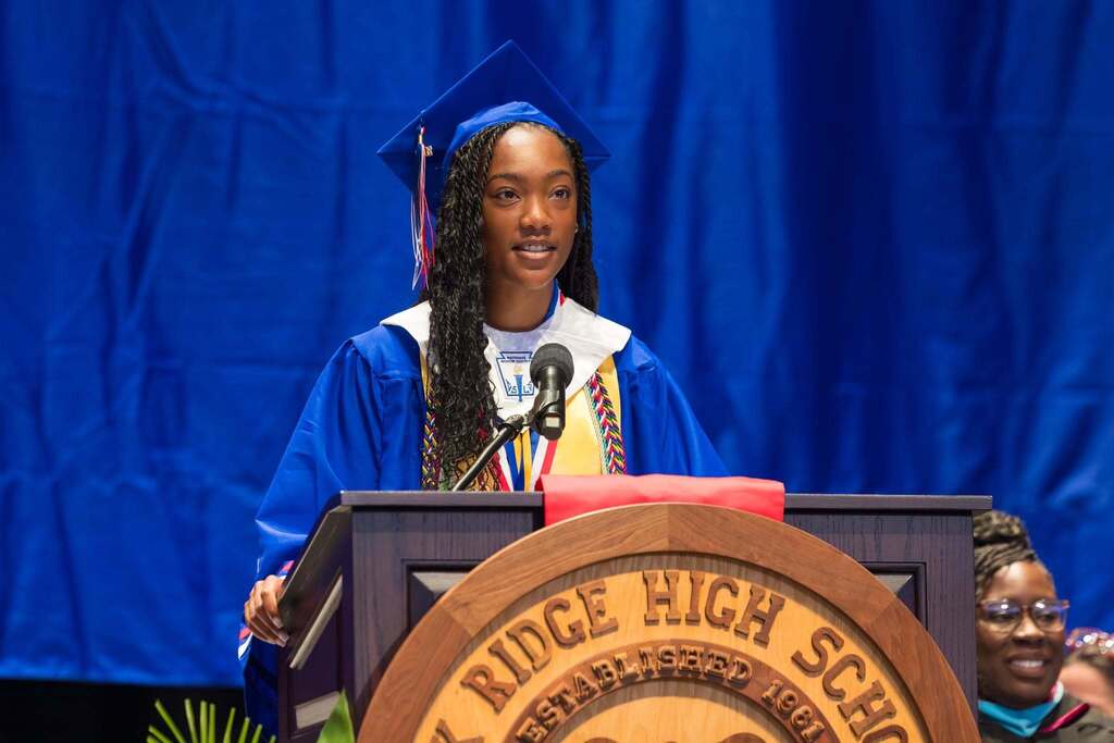 Senior makes a speech at graduation.