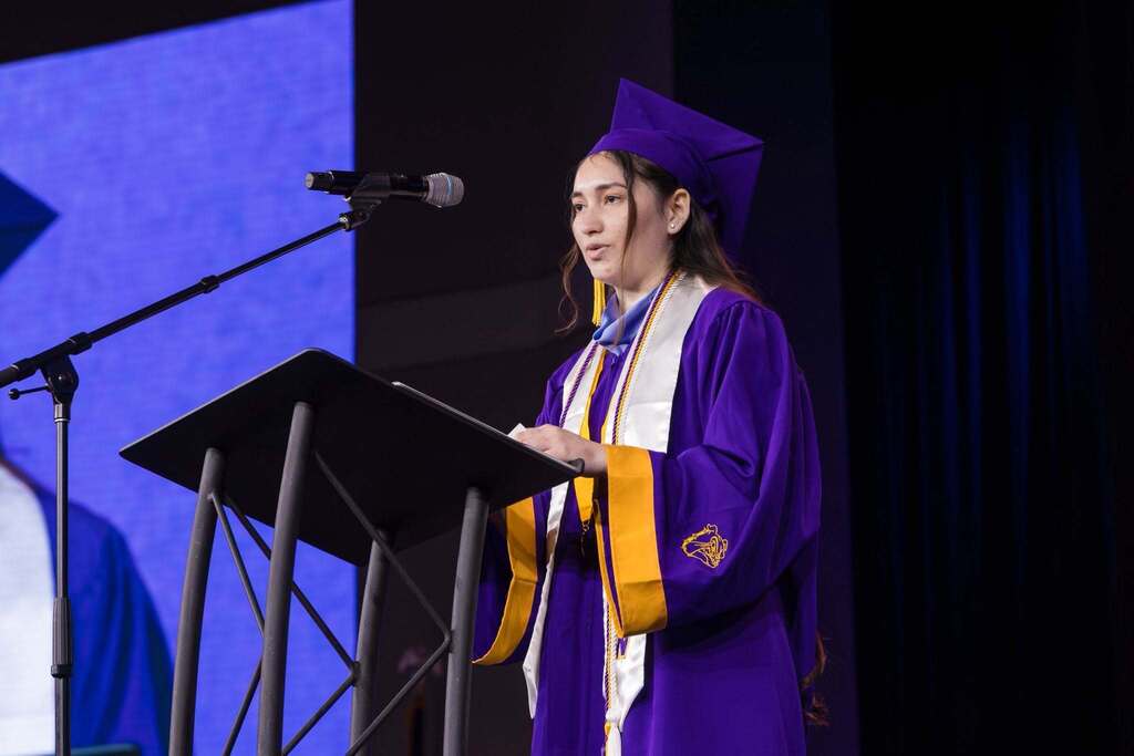 Senior gives speech a graduation ceremony.