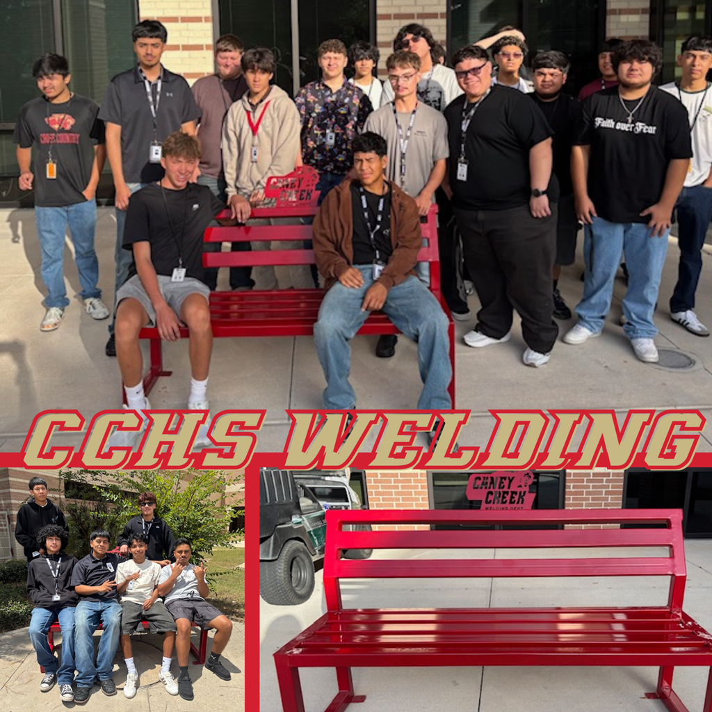 Welding students admire bench project