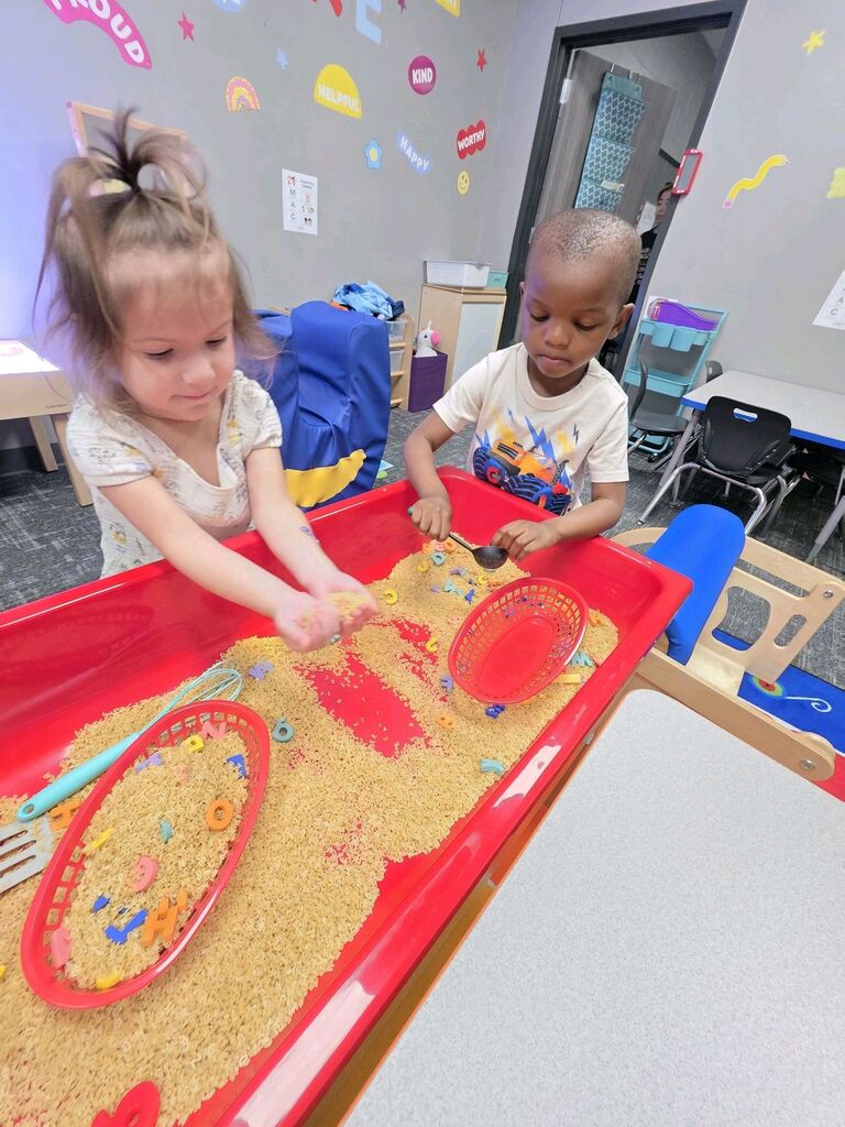 Early Childhood students exploring a center