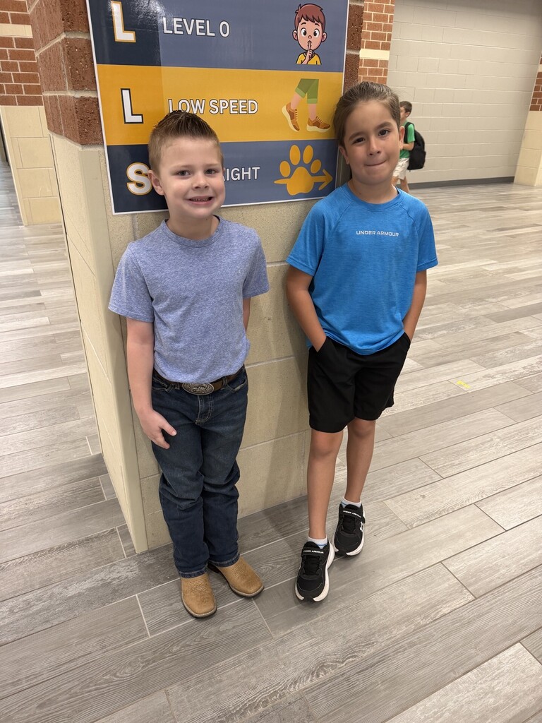 Students in blue for Mrs. Barber's birthday