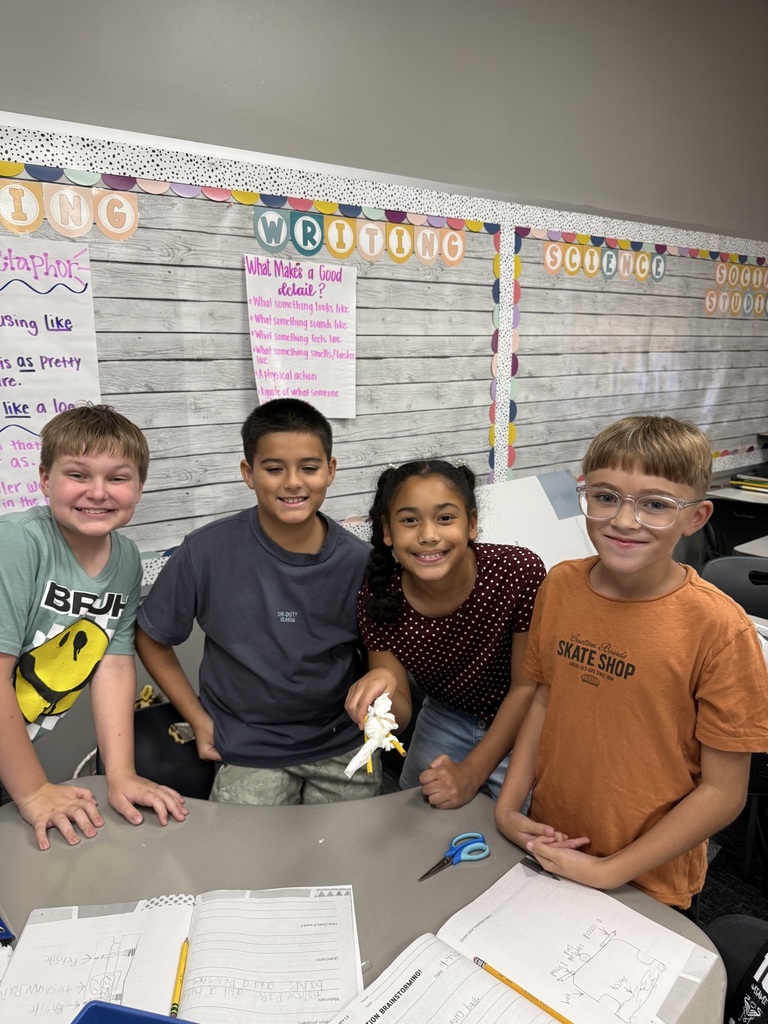 4th Graders collaborating 