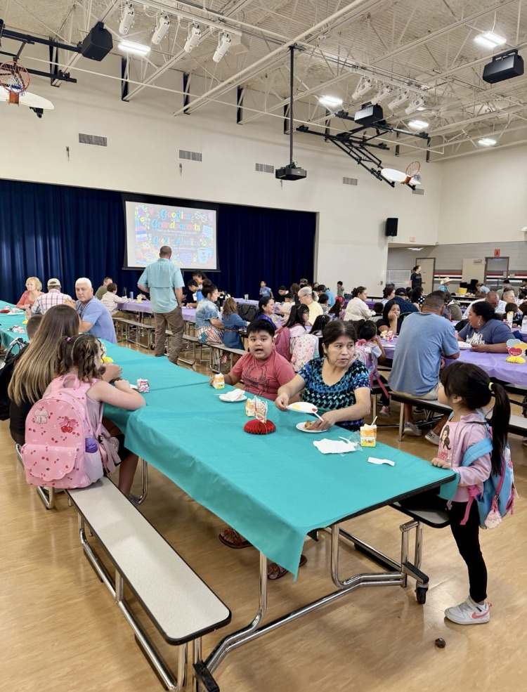 families and students enjoying goodies with grandparents eventeven at Creighton Elementary. I’m so glad.