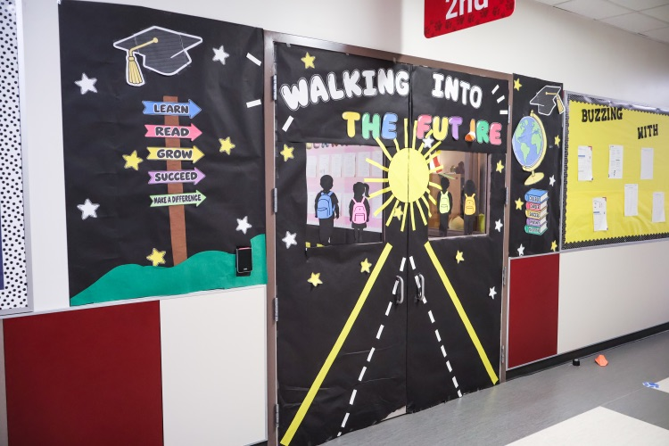 “Walking Into the Future” decorated classroom doors.