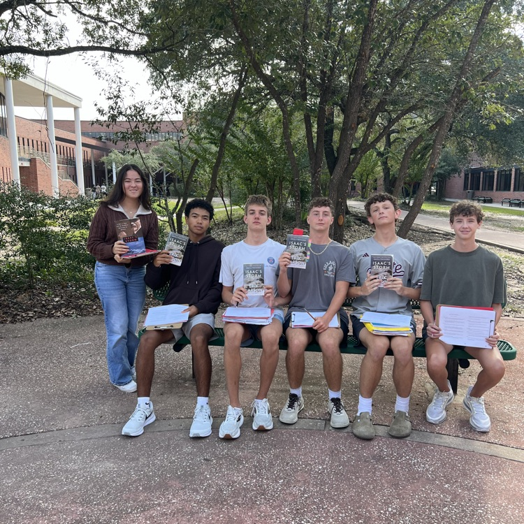Today’s forecast: 100% chance of reading, sunshine, and a little irony! English 2 honors students were studying _Isaac’s Storm_ while enjoying some beautiful weather today! ☀️📖