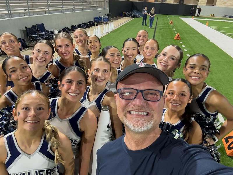 Dr. Vinson with the CPHS cheer team